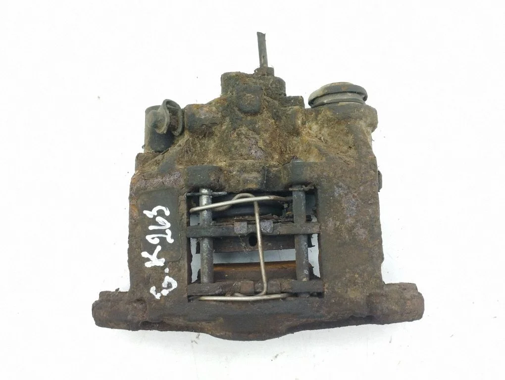 Rear brake caliper – left