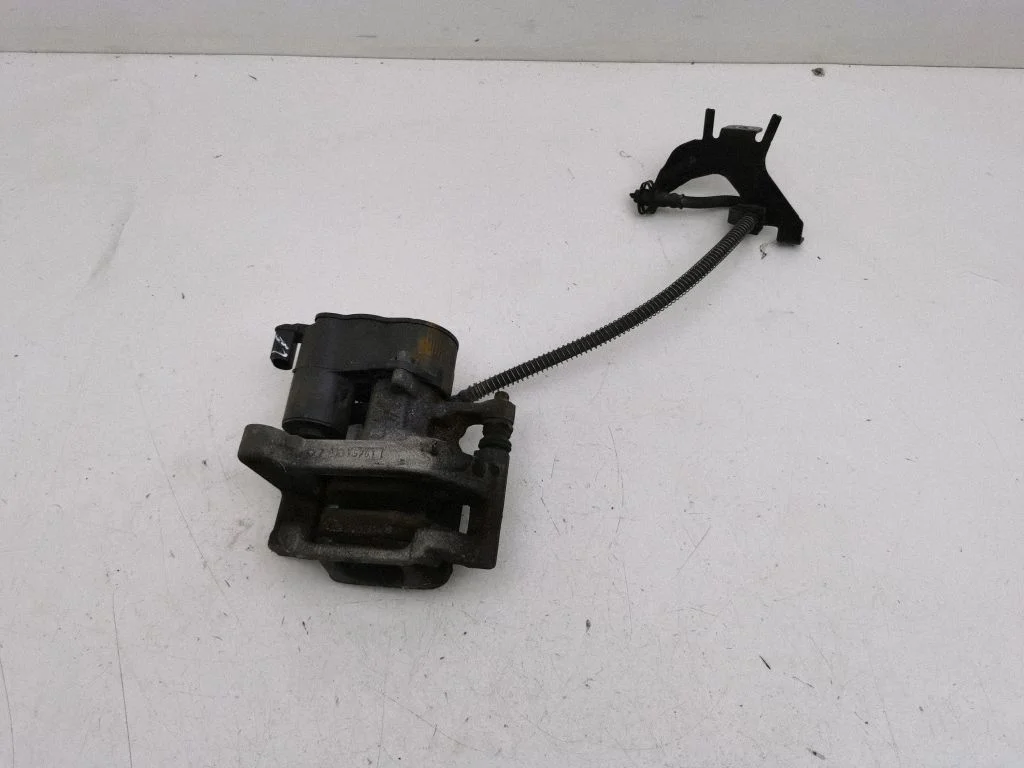 Rear brake caliper – right