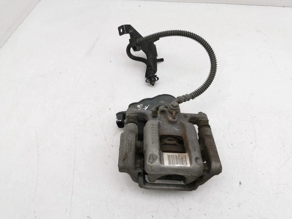 Rear brake caliper – left
