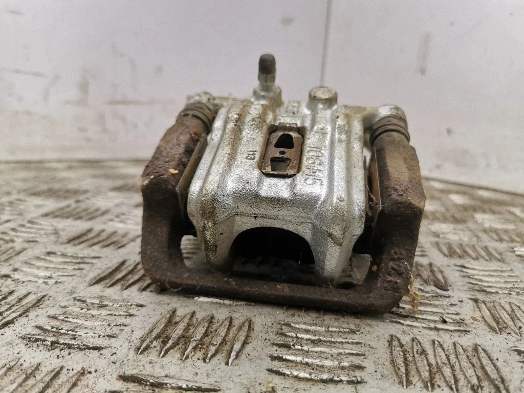 Rear brake caliper – right