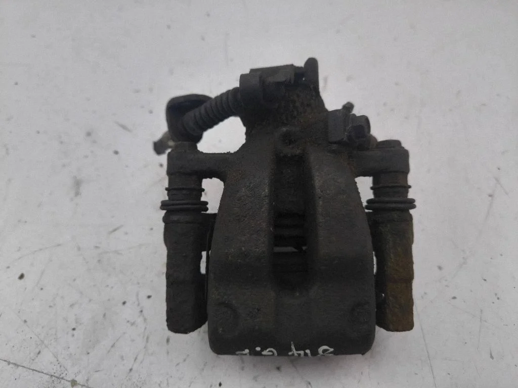 Rear brake caliper – right