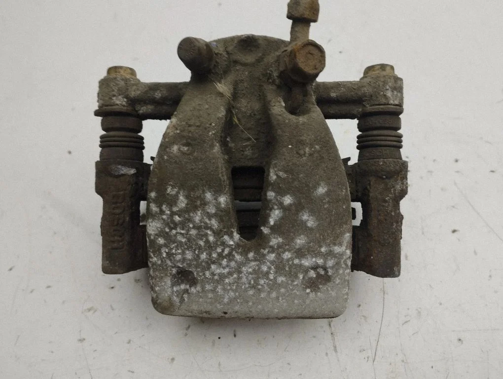 Rear brake caliper – right