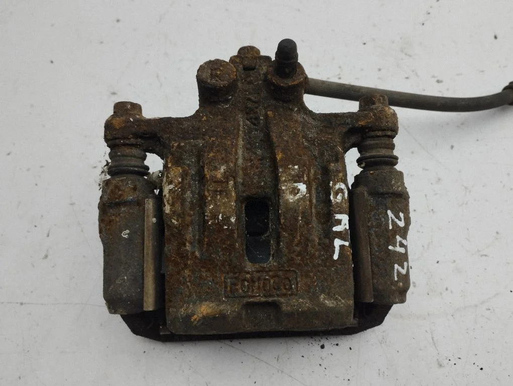 Rear brake caliper – right