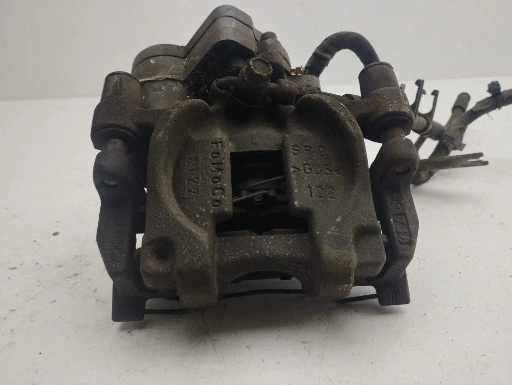 Rear brake caliper – right