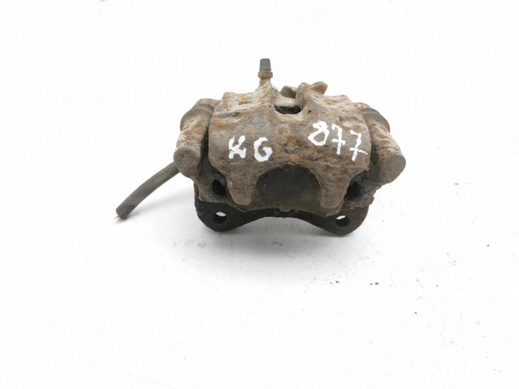 Rear brake caliper – left