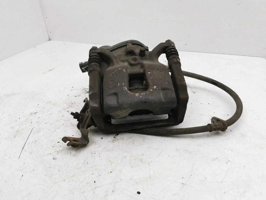 Rear brake caliper – right