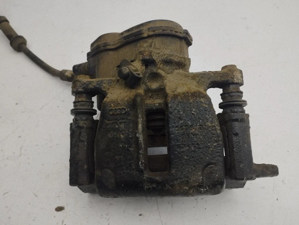 Rear brake caliper – right