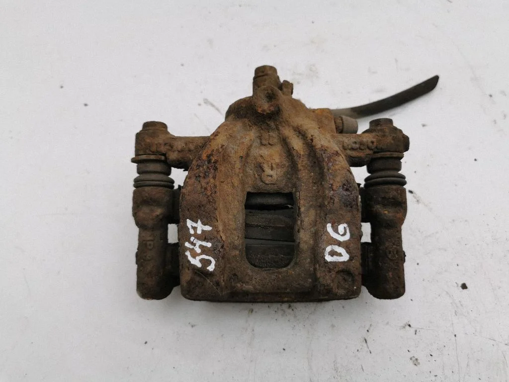 Rear brake caliper – right
