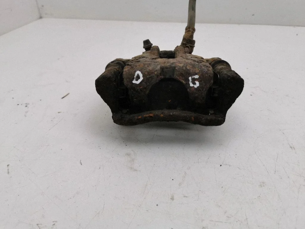 Rear brake caliper – right