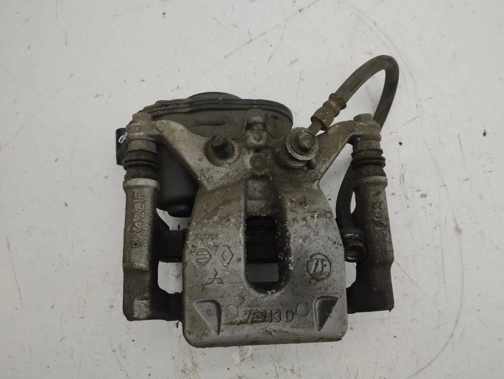 Rear brake caliper – right