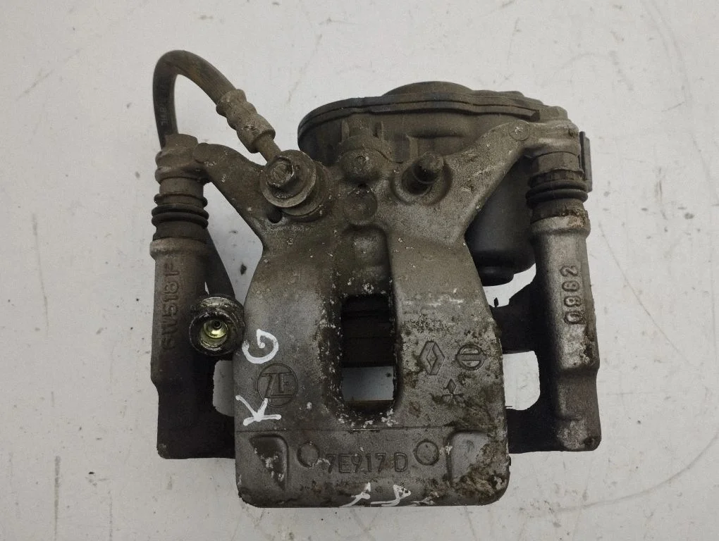 Rear brake caliper – left