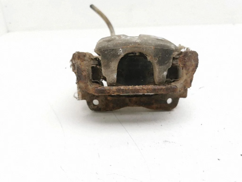 Rear brake caliper – left
