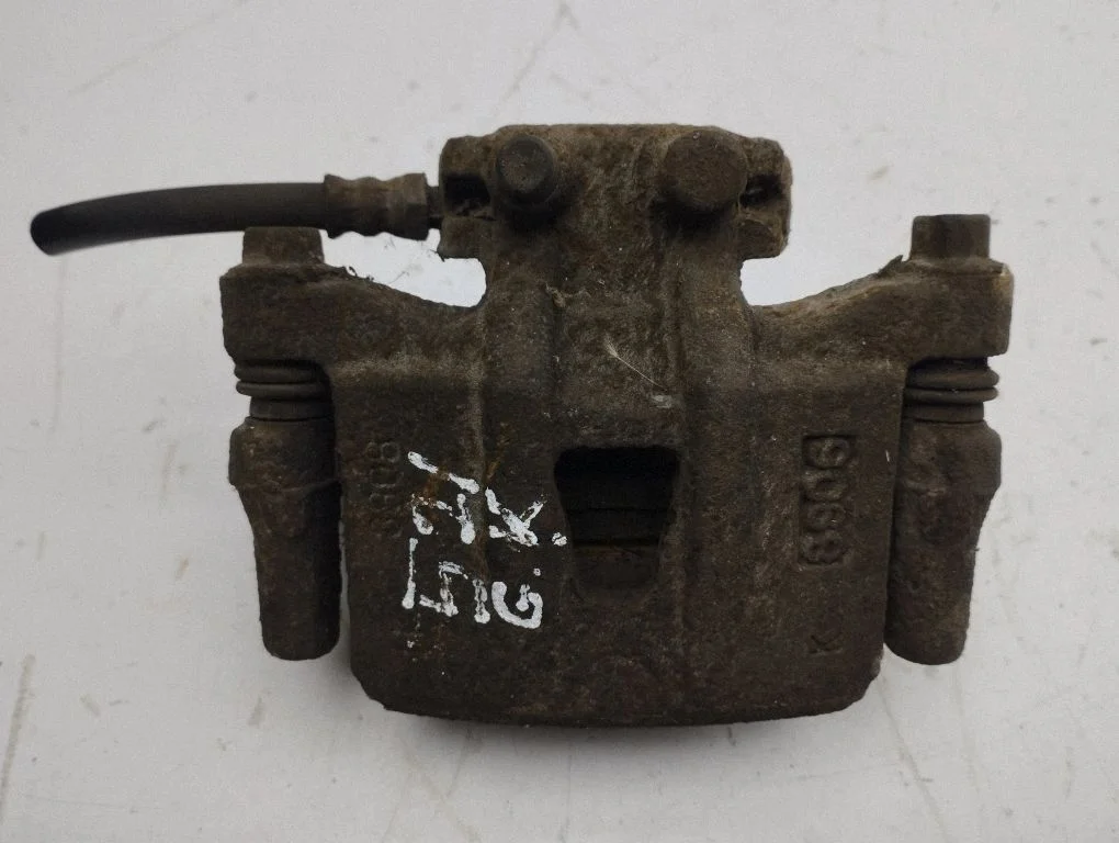 Rear brake caliper – left