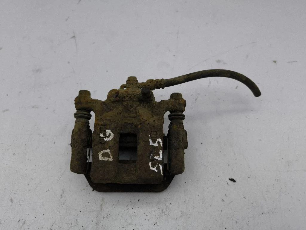 Rear brake caliper – right