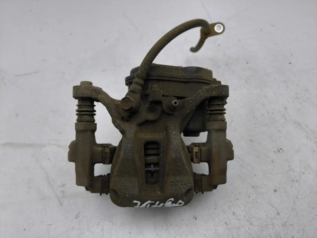 Rear brake caliper – right