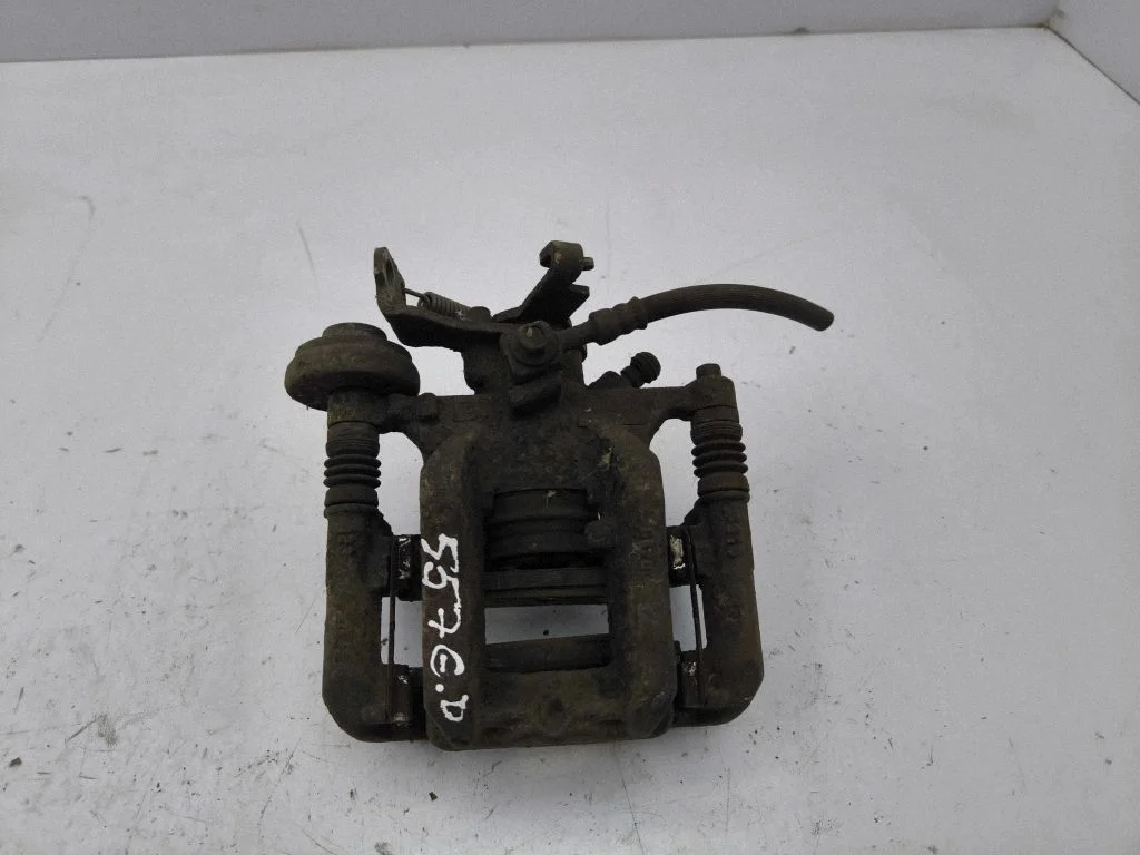 Rear brake caliper – right