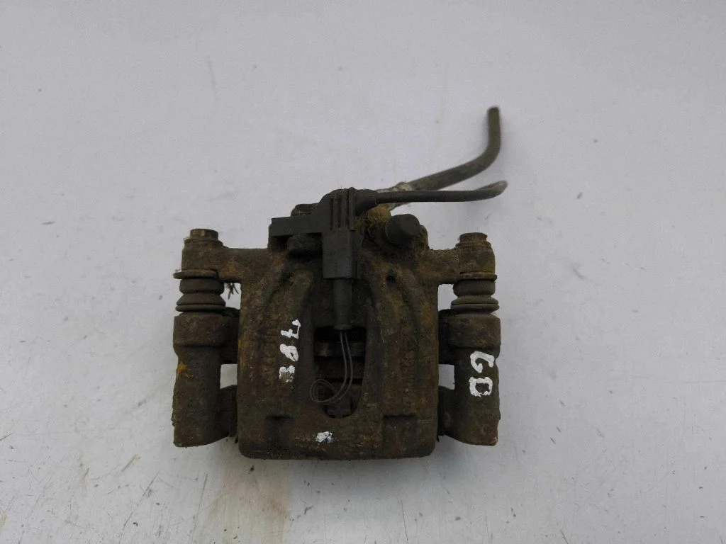 Rear brake caliper – right