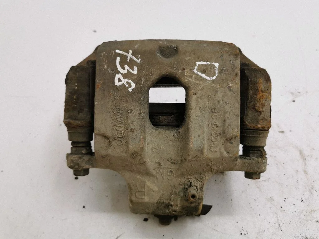Rear brake caliper – right
