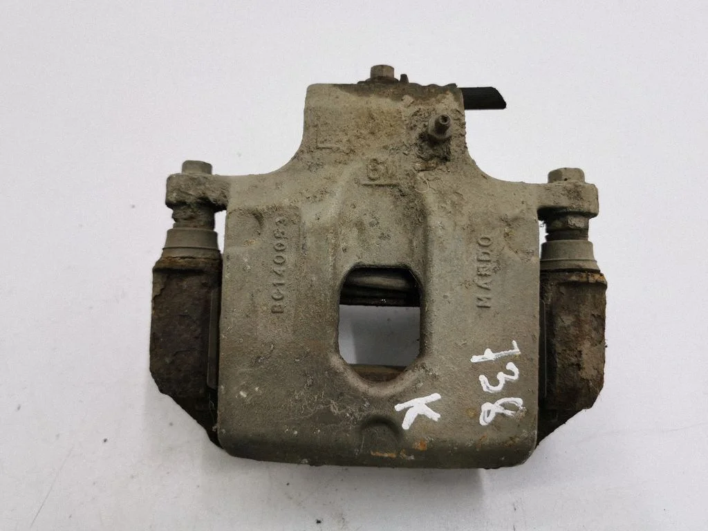 Rear brake caliper – left