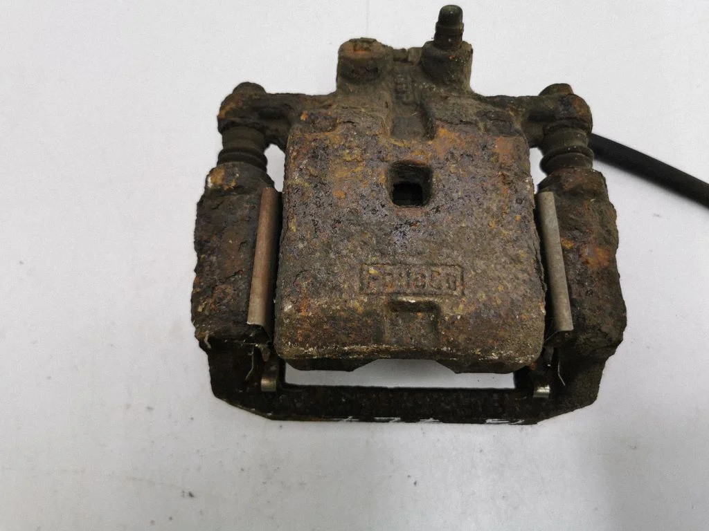 Rear brake caliper – right