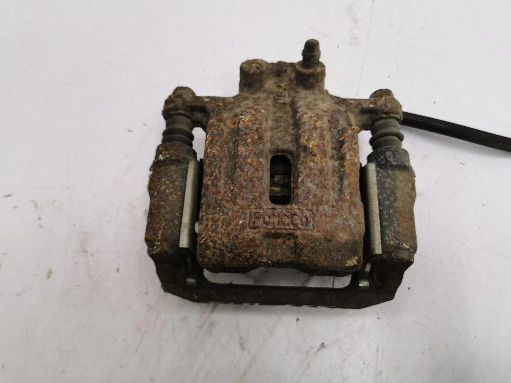 Rear brake caliper – right