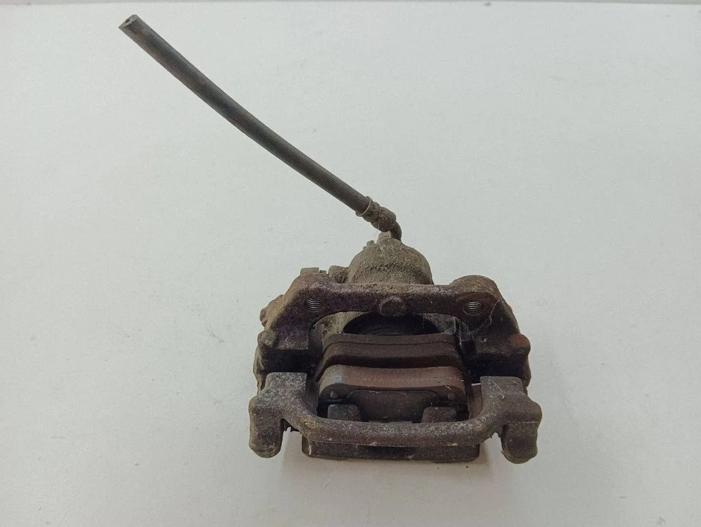 Rear brake caliper – right