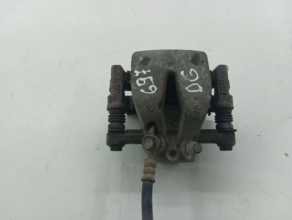 Rear brake caliper – right