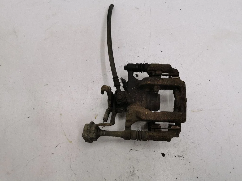 Rear brake caliper – right