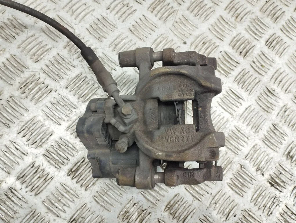 Rear brake caliper – right
