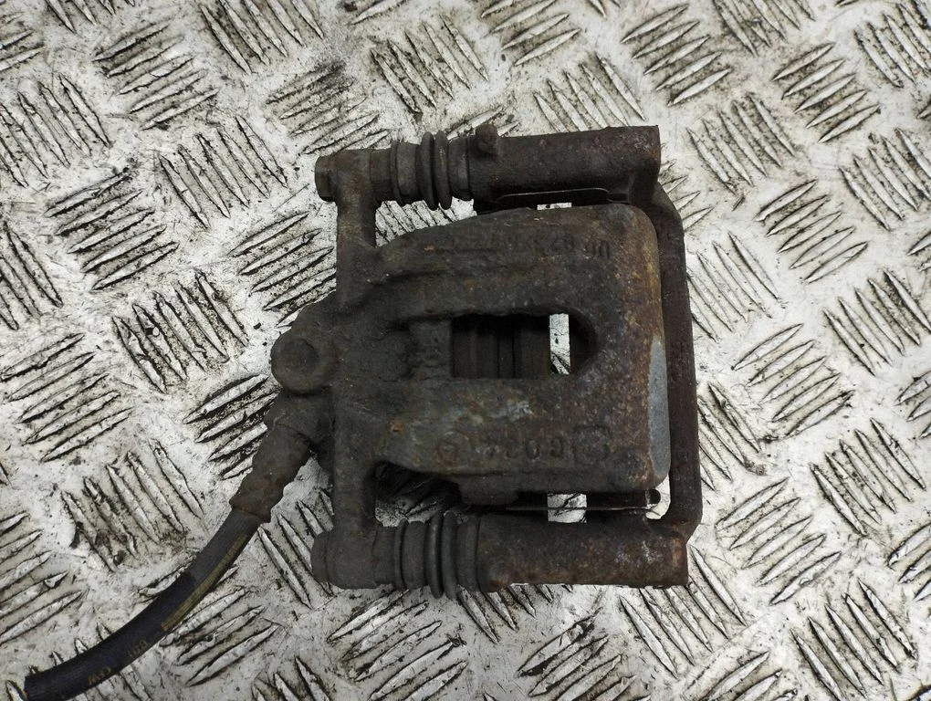 Rear brake caliper – right