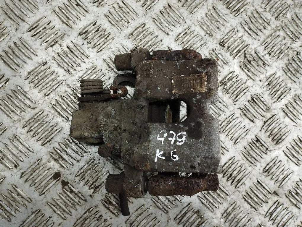 Rear brake caliper – left