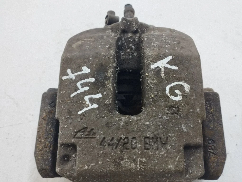 Rear brake caliper – left
