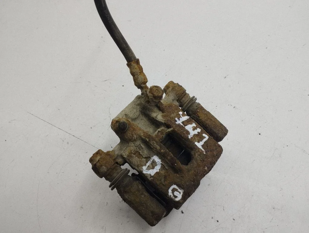 Rear brake caliper – right