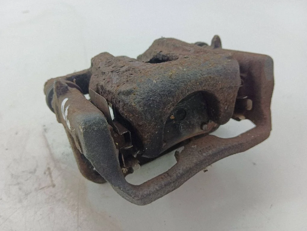 Rear brake caliper – right