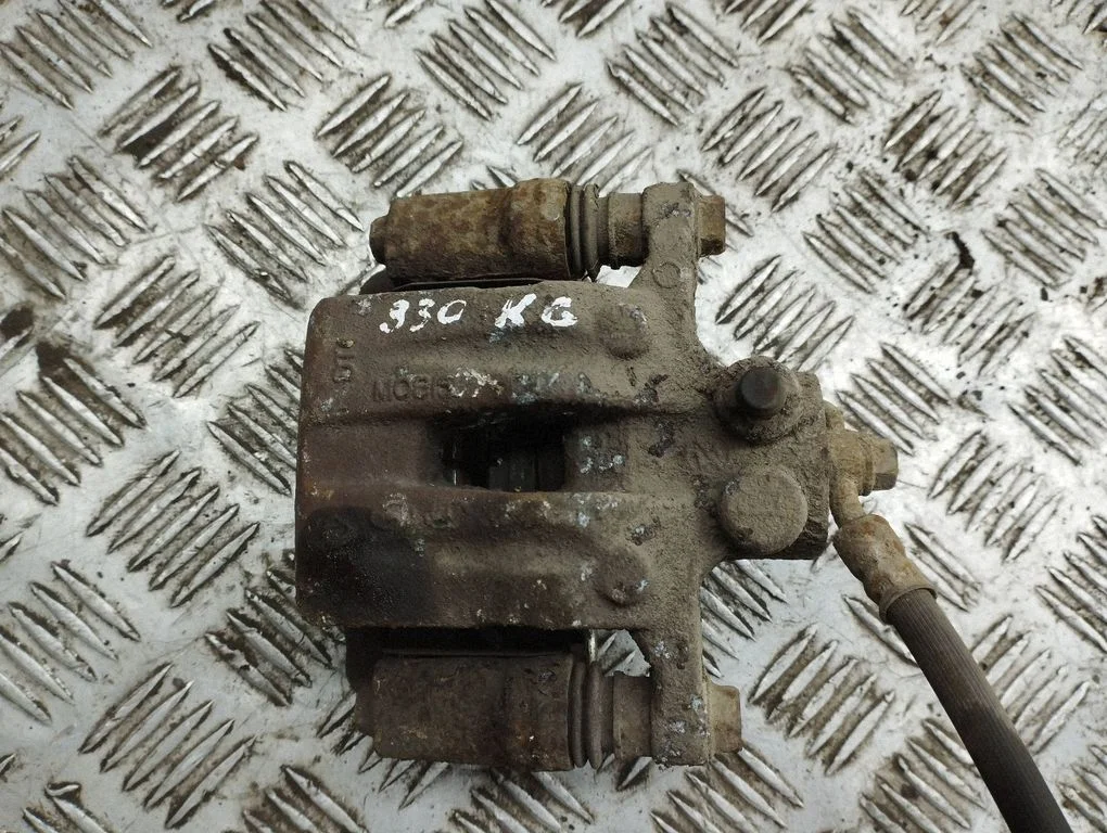 Rear brake caliper – left
