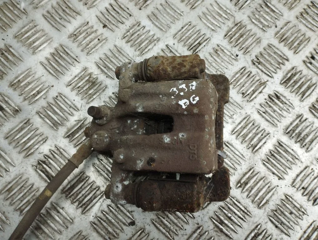Rear brake caliper – right