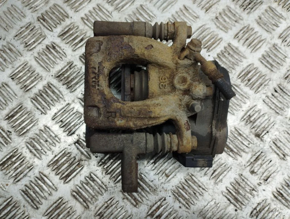 Rear brake caliper – right