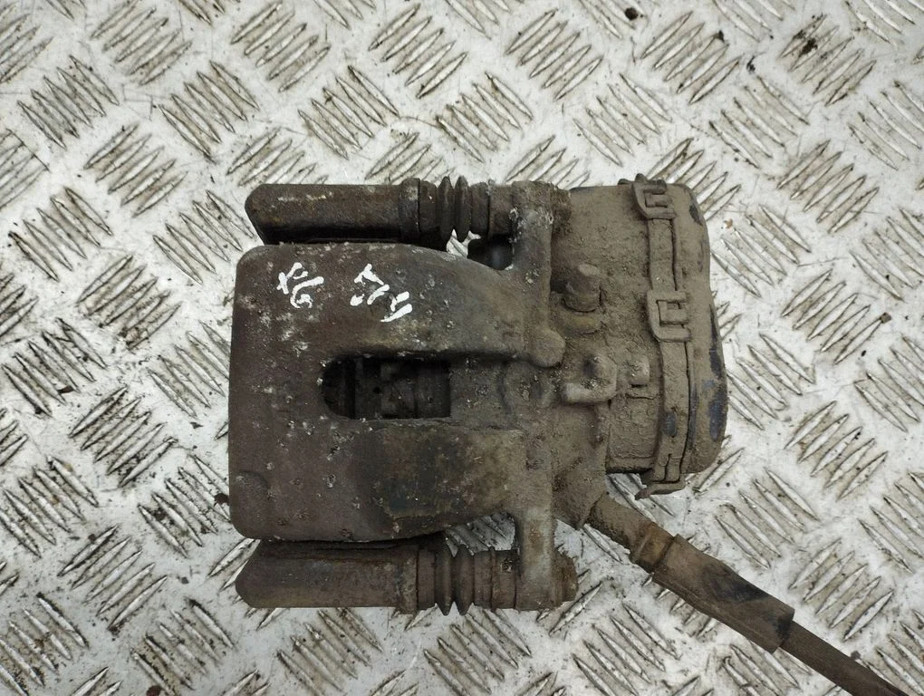 Rear brake caliper – left