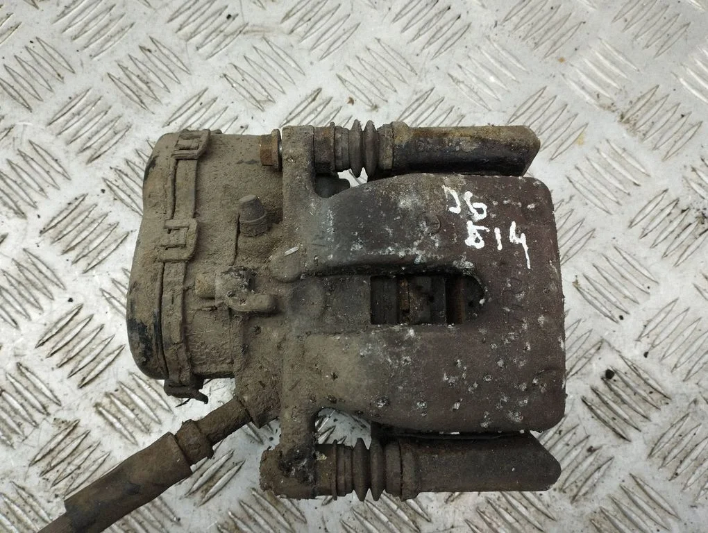 Rear brake caliper – right