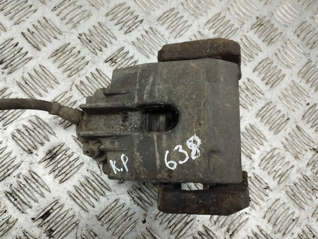 Rear brake caliper – left