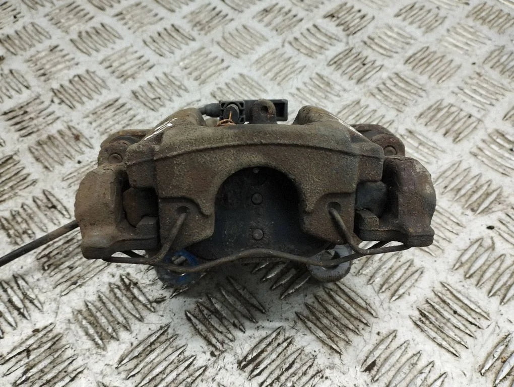 Rear brake caliper – right