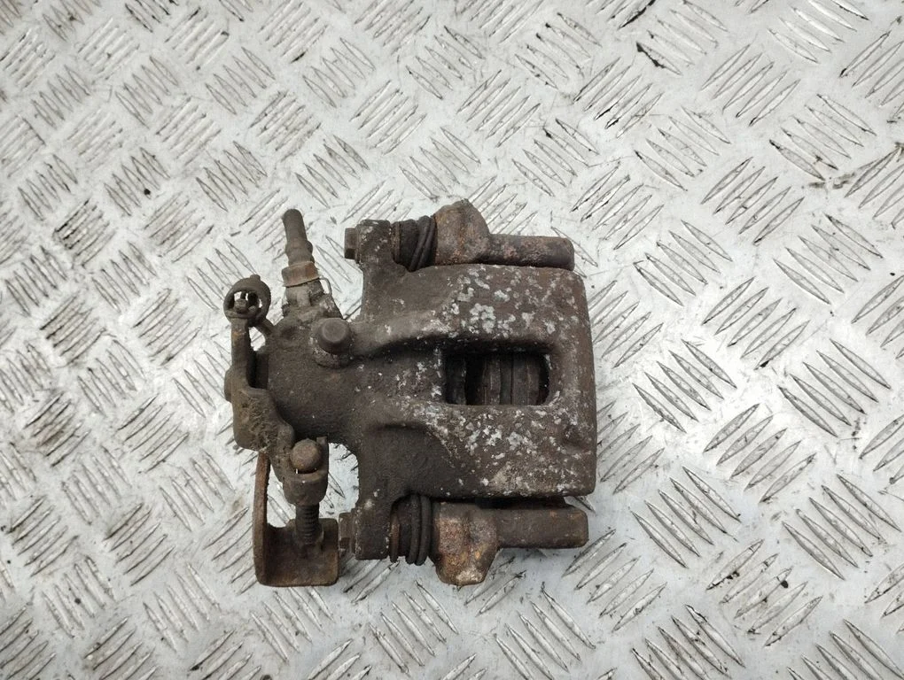 Rear brake caliper – right