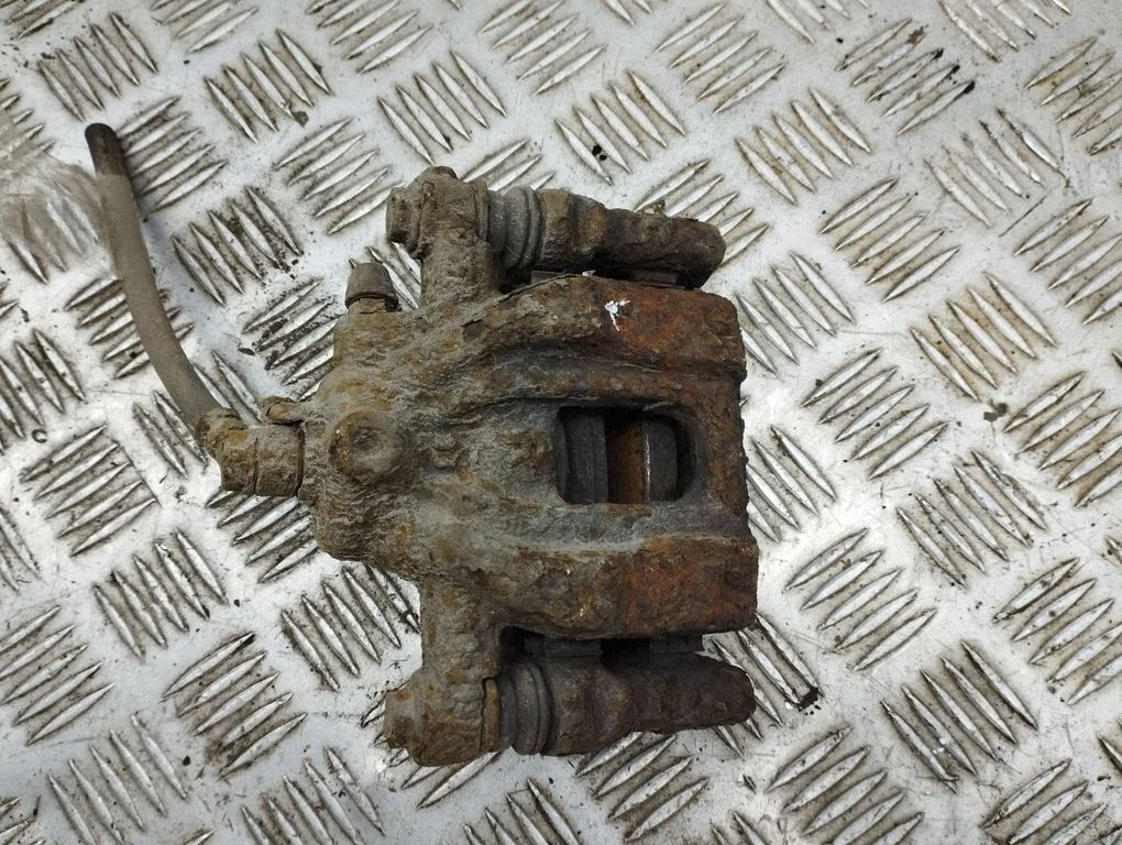 Rear brake caliper – right