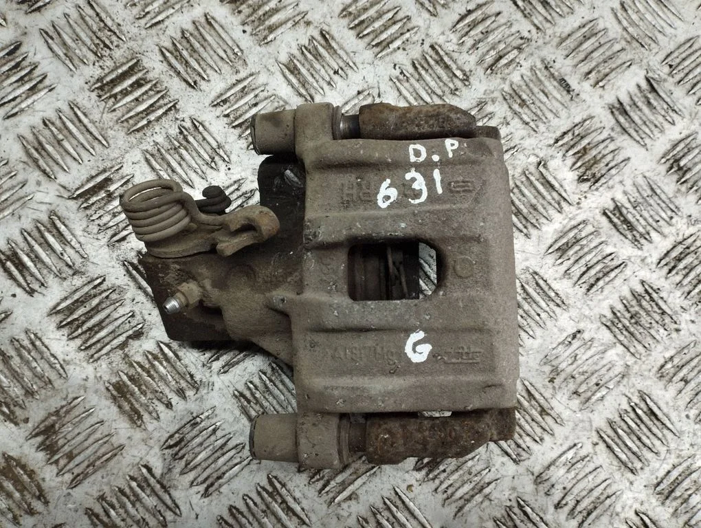 Rear brake caliper – right