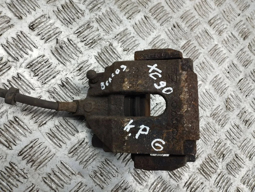 Rear brake caliper – left