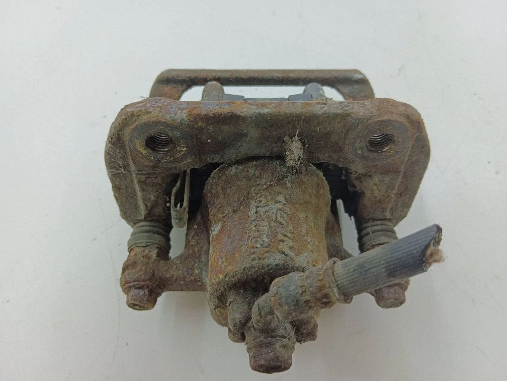 Rear brake caliper – right