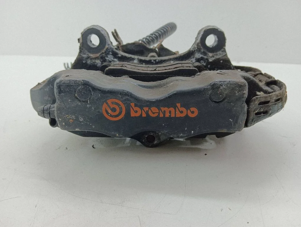 Rear brake caliper – left