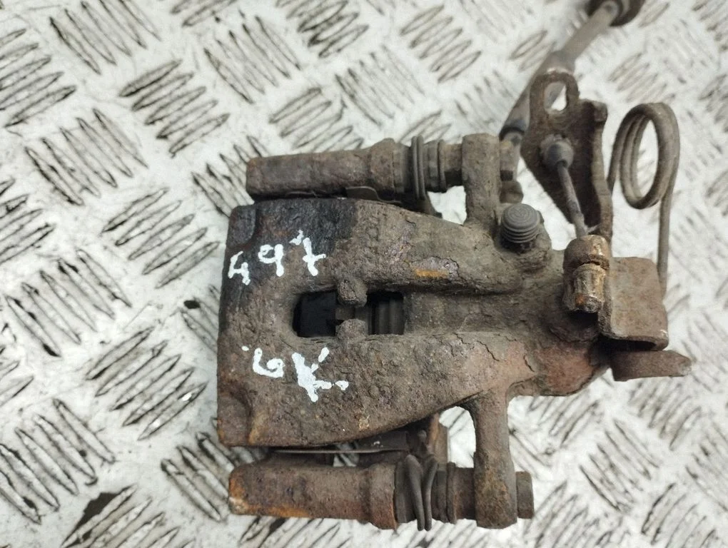 Rear brake caliper – rear left