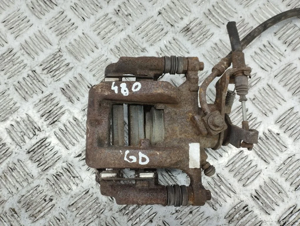 Rear brake caliper – right