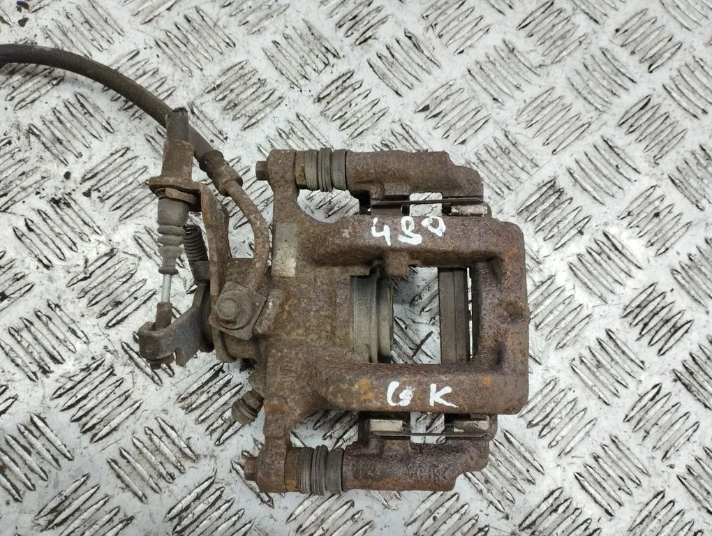 Rear brake caliper – rear left